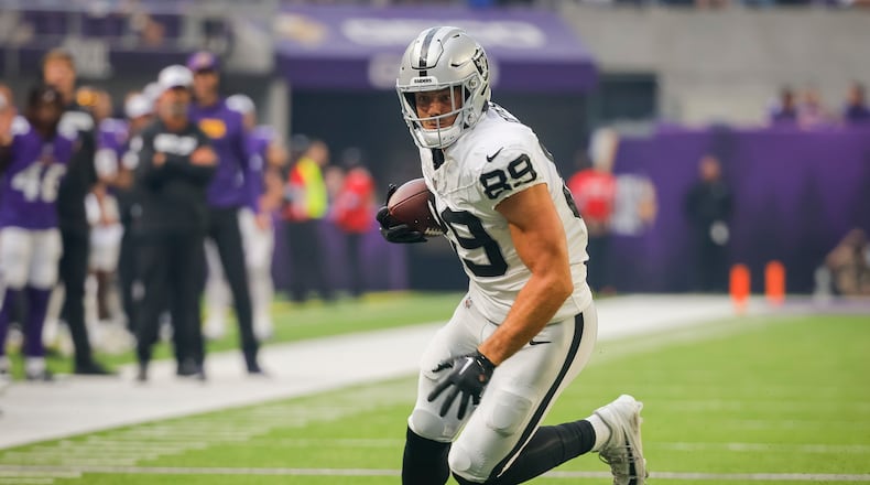 Las Vegas Raiders tight end Brock Bowers (89) runs after catching a pass against the Minnesota Vikings in the first quarter of an NFL preseason football game, Saturday, Aug. 10, 2024, in Minneapolis. (AP Photo/Bruce Kluckhohn)