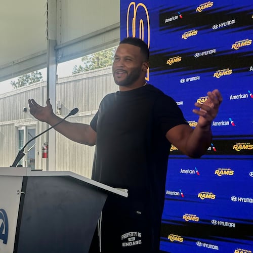 Aaron Donald speaks to the media at the Los Angeles Rams' training complex in Los Angeles, Sunday, Aug. 30, 2026. (AP Photo/Greg Beacham)