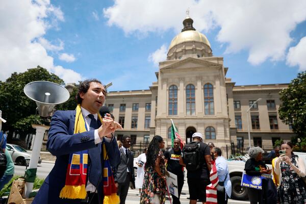 Georgia State Rep. Gabriel Sanchez, D-Smyrna, speaks to participants at a rally outside the State Capitol after announcing that Georgia Republican leaders will not redraw the state’s political maps during a special legislative session on Wednesday, June 17, 2026. (Miguel Martinez/AJC)