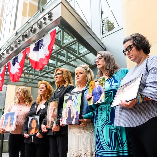 Parents hold pictures of their deceased children during a protest against social media platforms outside the Ronald V. Dellums Federal Building and U.S. Courthouse on Tuesday, Aug. 18, 2026, in Oakland, Calif. (AP Photo/Noah Berger)