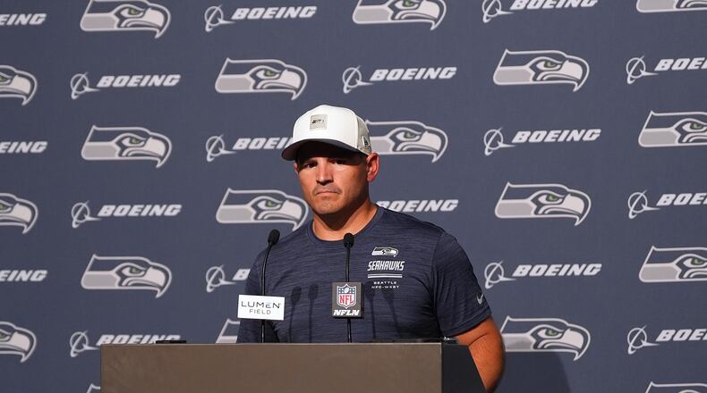 Seattle Seahawks head coach Mike Macdonald speaks during a press availability after the NFL football team's training camp, Saturday, Aug. 8, 2026, in Seattle. (AP Photo/Lindsey Wasson)
