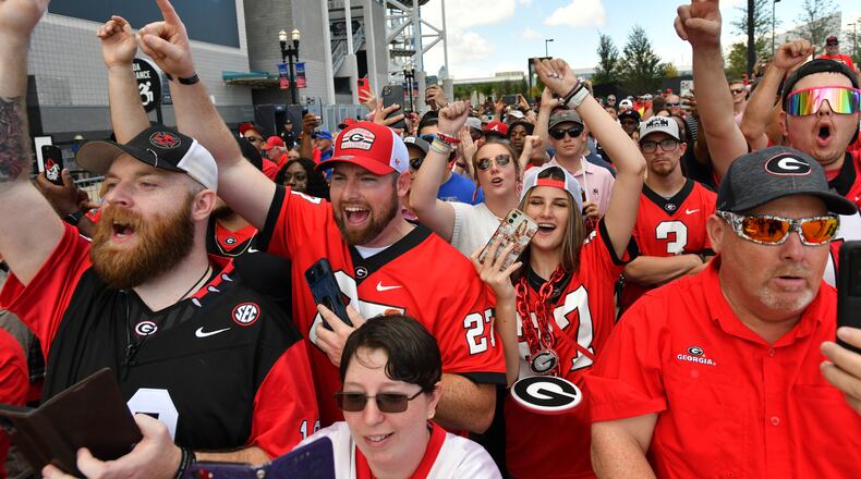 Georgia fans cheer as players and coaching staff arrive during the Dawg Walk to play Florida during an NCAA football game at EverBank Stadium, Saturday, October 28, 2023, in Jacksonville, FL. (Hyosub Shin / Hyosub.Shin@ajc.com)