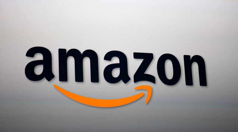 SANTA MONICA, CA - SEPTEMBER 6: The Amazon logo is projected onto a screen at a press conference on September 6, 2012 in Santa Monica, California. Amazon unveiled the Kindle Paperwhite and the Kindle Fire HD in 7 and 8.9-inch sizes. (Photo by David McNew/Getty Images)