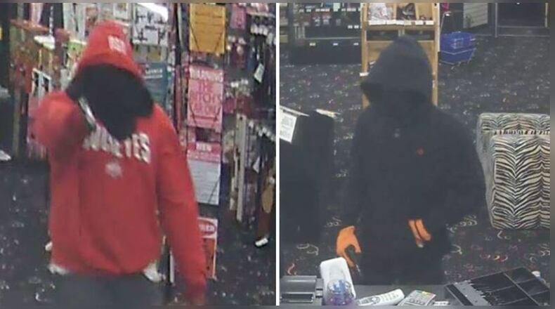 Authorities are looking for two men who assaulted employees during an armed robbery at Starship Enterprises in Conyers.