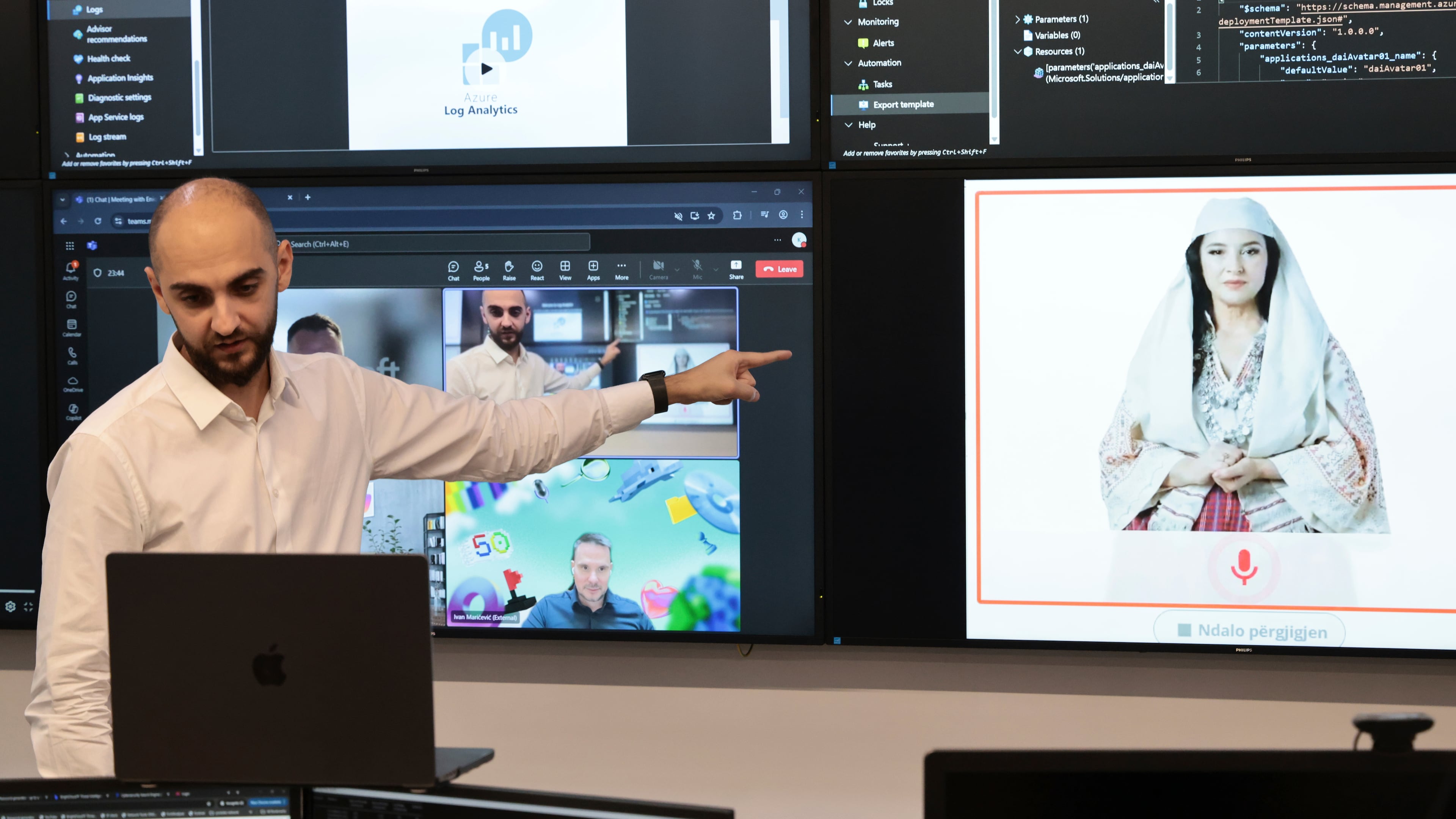 Enio Kaso, head of the Department of Artificial Intelligence and Cryptocurrency Licensing shows the AI "minister" Diella, whose name means "Sun" in Albanian, during a conference call in Tirana, Albania, Friday, Sept. 12, 2025. (AP Photo/Vlasov Sulaj)