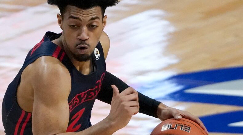 Dayton's Ibi Watson heads to the basket against Saint Louis during the first half Tuesday, Jan. 26, 2021, in St. Louis. (Jeff Roberson/AP)