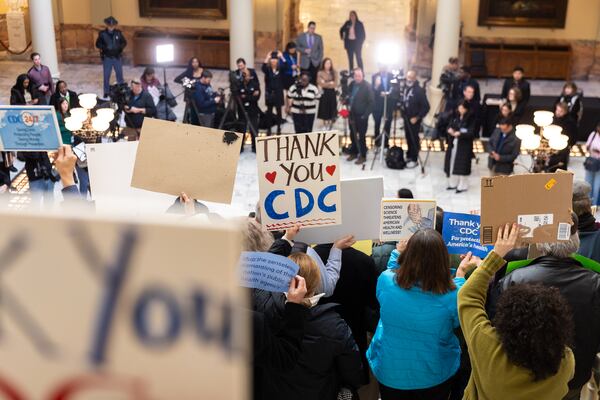 Supporters and public health workers, including fired Centers for Disease Control and Prevention workers, gather at the Capitol in Atlanta on Friday, Feb. 21, 2025, to protest the CDC cuts of hundreds of employees. (Arvin Temkar/AJC)