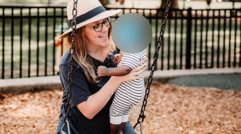 This edited photo provided by the law firm Peiffer Wolf Carr Kane Conway & Wise shows their client, Krystena Murray, holding a baby to whom she gave birth in December 2023. Murray on Tuesday filed a civil lawsuit against Coastal Fertility Specialists for allegedly implanting the wrong embryo into her uterus.