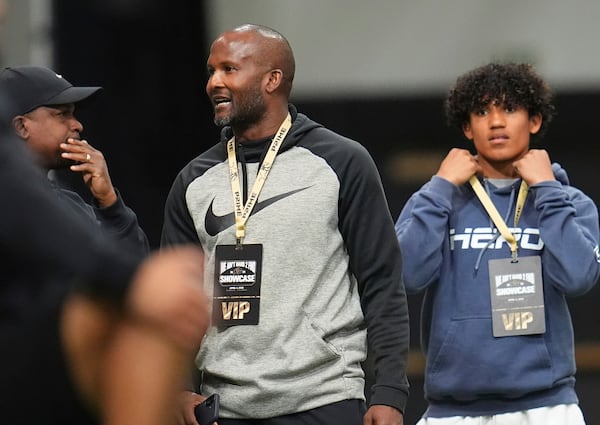 Pro Football Hall of Fame defensive back Champ Bailey looks on as players take part in the 40-yard dash during Colorado's NFL football pro day Friday, April 4, 2025, in Boulder, Colo. (AP Photo/David Zalubowski)