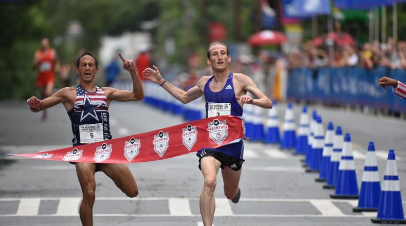 A rare photo finish took place for the top spot in the 2015 AJC Peachtree Road Race.