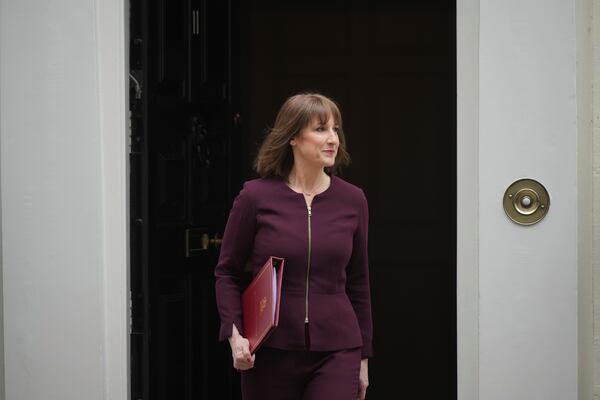 Britain's Chancellor of the Exchequer, Rachel Reeves, leaves 11 Downing Street to deliver the spring statement at the House of Commons in London, Wednesday, March 26, 2025. (AP Photo/Alastair Grant)