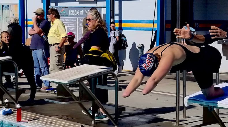 Aimee Copeland dives off the starting blocks during warmups last month at the Paralympic National Swimming Championships in Tucson, Ariz. CONTRIBUTED