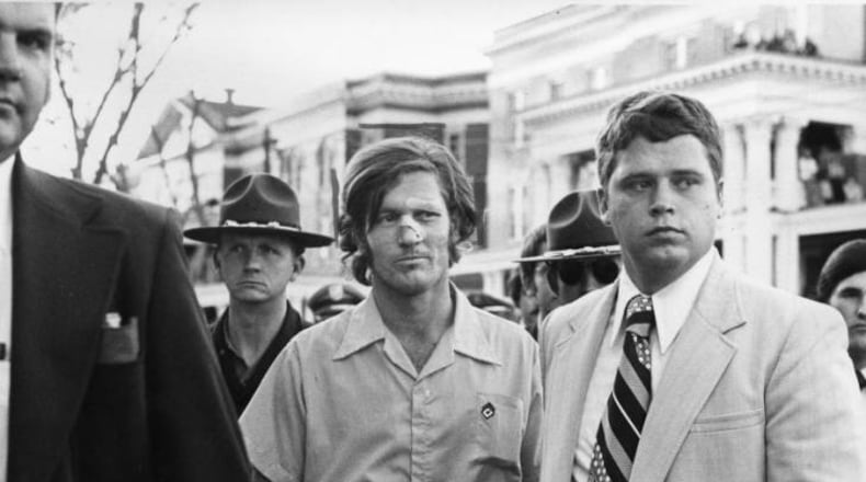 November 1974: Serial killer Paul John Knowles, aka 'The Casanova Killer,' was captured in suburban Henry County, Ga., when he attempted to crash through a police roadblock near Stockbridge. Local citizens captured Knowles and called authorities. BILLY DOWNS / AJC FILE