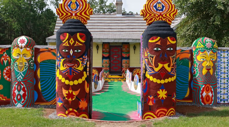 The vibrantly restored entrance to Pasaquan, with painted totems that appear throughout the site. Pasaquan is an art installation created by the late visionary artist Eddie Owens Martin in Buena Vista, Ga. Bob Andres / bandres@ajc.com
