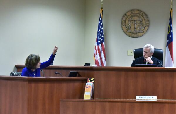 Wendy Gunn appeals to Chief Judge Michael Greene at Gwinnett County Recorder’s Court on June 20, 2018. With so many school districts now using school bus cameras, the AJC examined the process of how alleged perpetrators are identified and what legal recourse one has if they want to fight the citation. (Hyosub Shin/AJC)