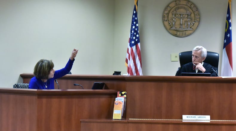 Wendy Gunn (left) appeals to Chief Judge Michael Greene at Gwinnett County Recorder’s Court on Tuesday, June 20, 2018. With so many school districts now using school bus cameras, we look at the process of how the alleged perpetrator is identified and what legal recourse does one have it you want to fight the citation. HYOSUB SHIN / HSHIN@AJC.COM