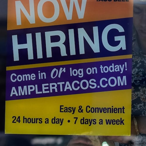 FILE - A hiring sign is displayed at a restaurant in Niles, Ill., Thursday, May 14, 2026. (AP Photo/Nam Y. Huh, File)