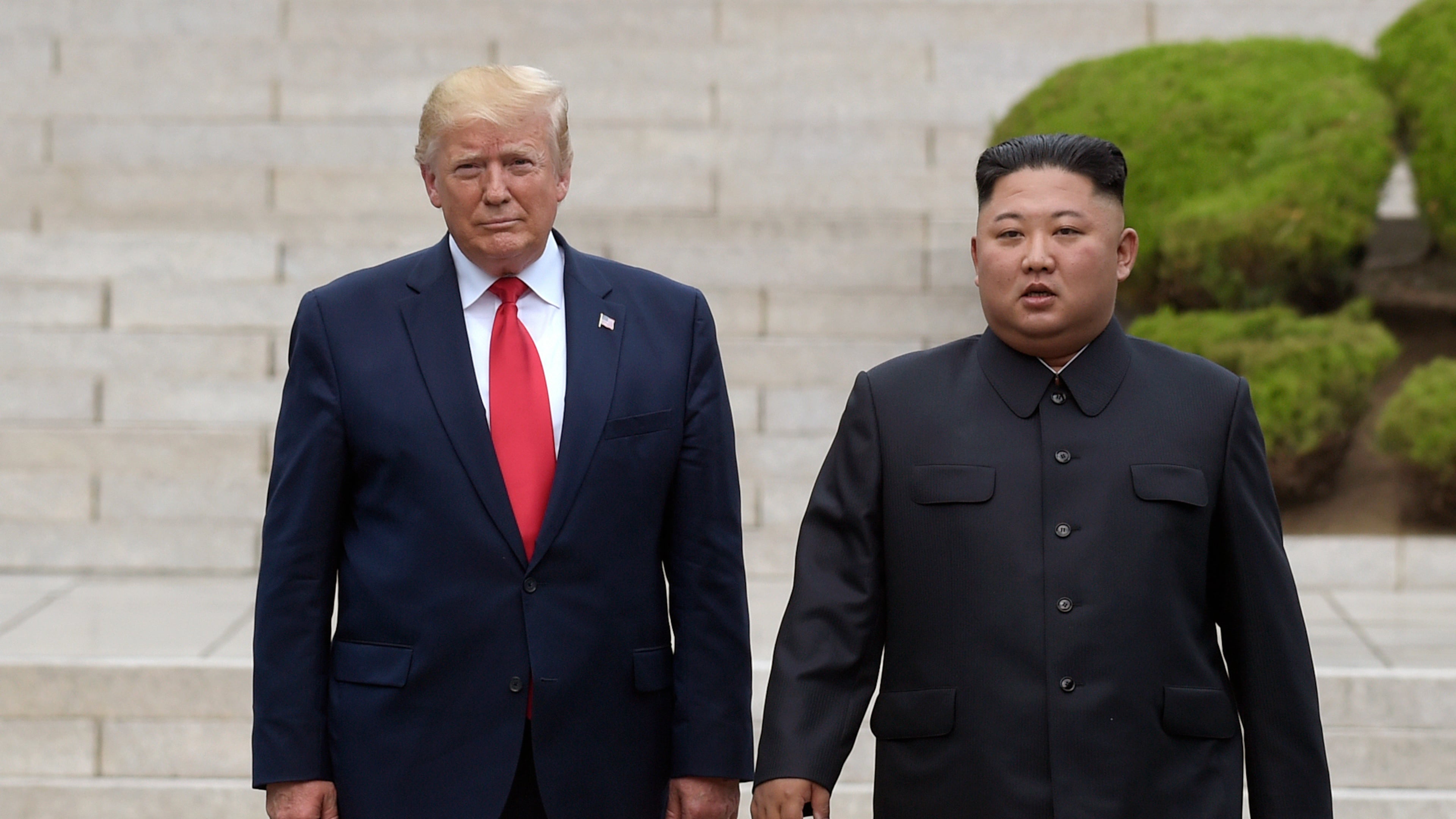 FILE - Then U.S. President Donald Trump, left, meets with North Korean leader Kim Jong Un at the North Korean side of the border at the village of Panmunjom in Demilitarized Zone, on June 30, 2019. (AP Photo/Susan Walsh, File)