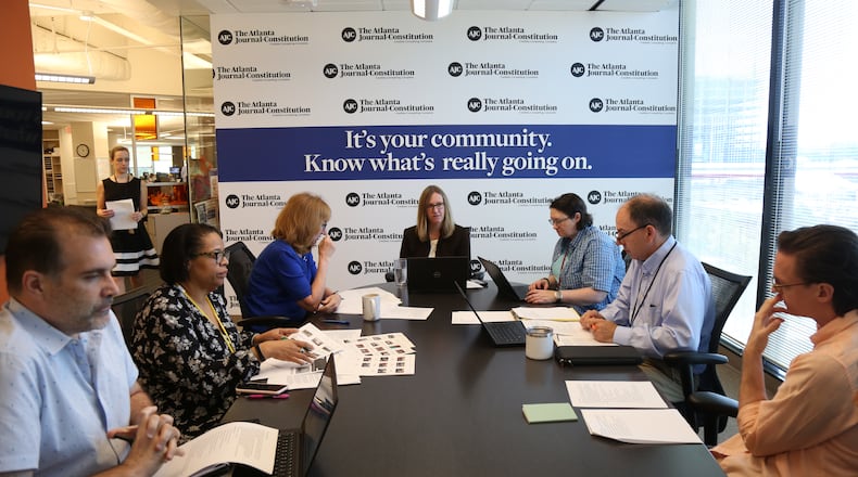 In this 2019 photo, members of the AJC newsroom staff meet to discuss plans for the "Unprotected" series, a year-long investigative look into Georgia's senior care home system.