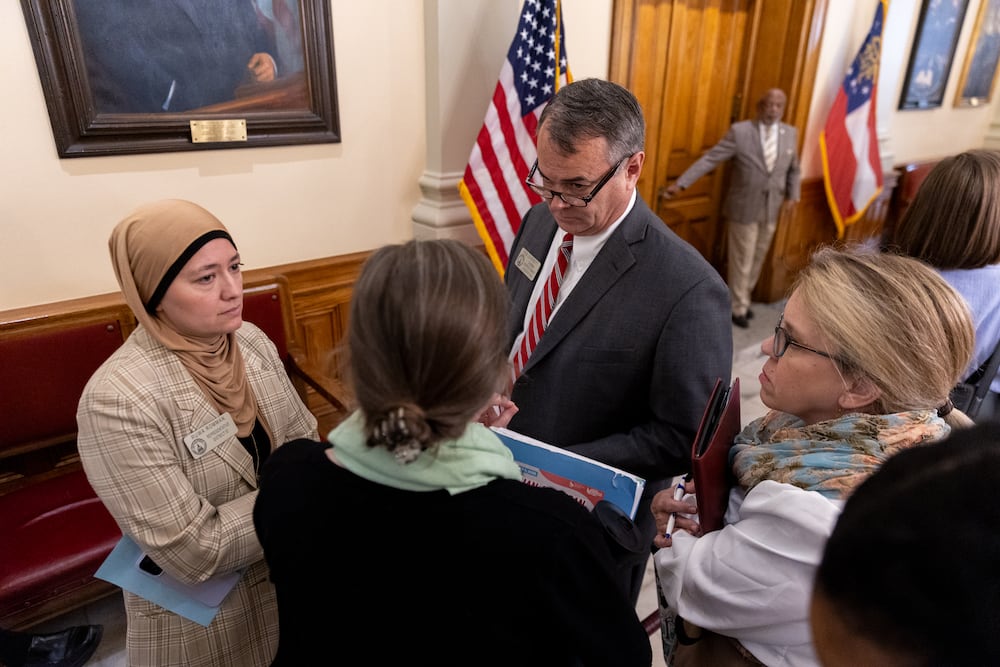 State Rep. Ruwa Romman (left) D-Duluth, and Rep. Rob Leverett, R-Elberton, are pictured participating in a discussion at the Capitol in Atlanta in March.