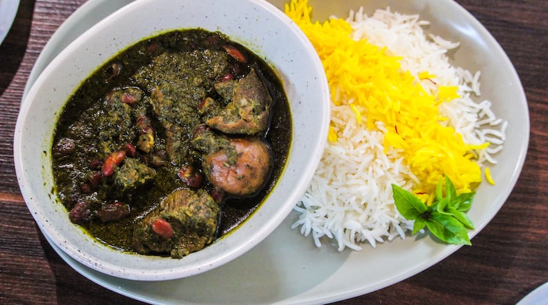 A great version of ghormeh sabzi, which roughly translates to "braised herbs," is served at Persian Basket Kitchen & Bar in Johns Creek. Courtesy of Green Olive Media