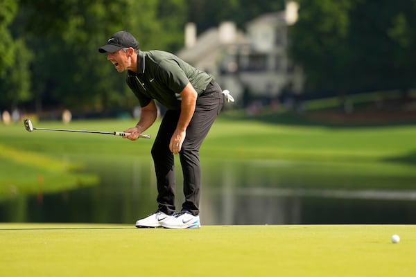 Rory McIlroy, of Northern Ireland, reacts after missing a putt on the 16th hole during the first round of the PGA Championship golf tournament at the Quail Hollow Club, Thursday, May 15, 2025, in Charlotte, N.C. (AP Photo/David J. Phillip)