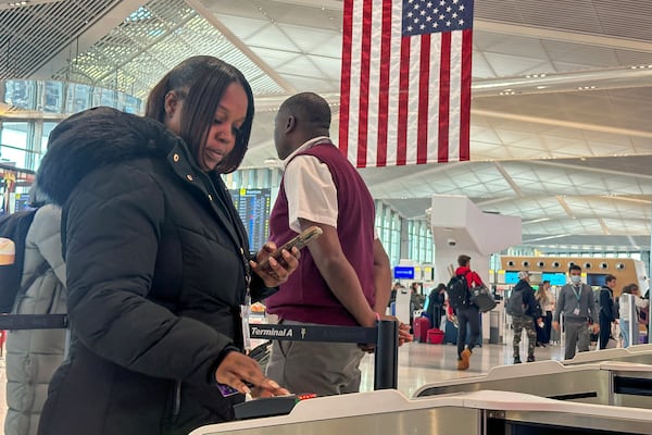 FILE - Departing air travelers enter the TSA PreCheck screening lane at Newark Liberty International Airport in New Jersey, Dec. 19, 2024. (AP Photo/Ted Shaffrey, File)
