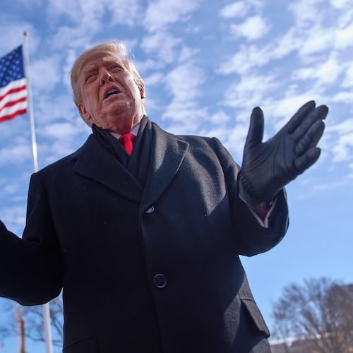 “I don’t like that he had a gun,” President Donald Trump said of the Veterans Affairs nurse gunned down by the feds. “I don’t like that he had two fully loaded magazines. That’s a lot of bad stuff.” (Evan Vucci/AP)