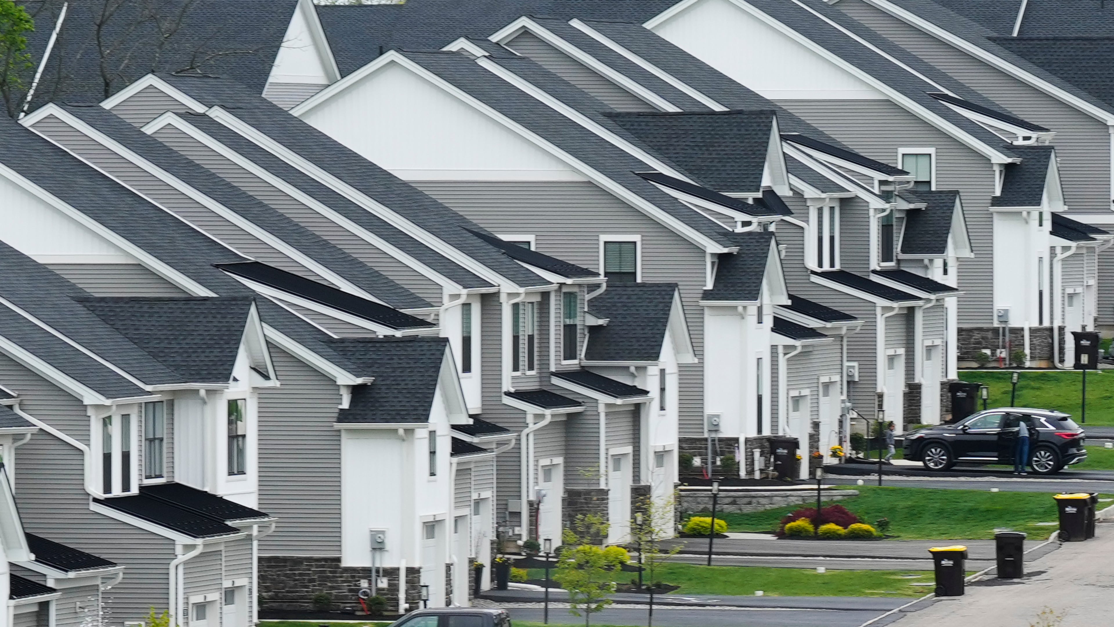 FILE - Newly developed homes sit in a row in Eagleville, Pa., April 28, 2023. (AP Photo/Matt Rourke, File)