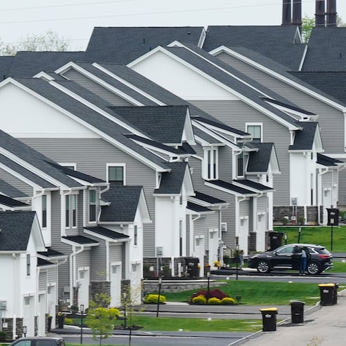 FILE - Newly developed homes sit in a row in Eagleville, Pa., April 28, 2023. (AP Photo/Matt Rourke, File)