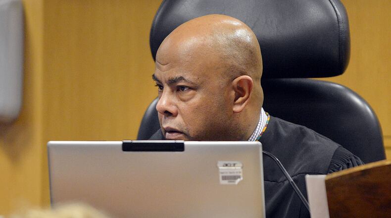 Judge Ural Glanville presides over Stacey Kalberman's whistleblower lawsuit in Fulton County Superior Court Monday, March 31, 2014. The former ethics commission director sued her former employer in 2011 and claims she was forced from office for investigating Gov. Nathan Deal's 2010 campaign.