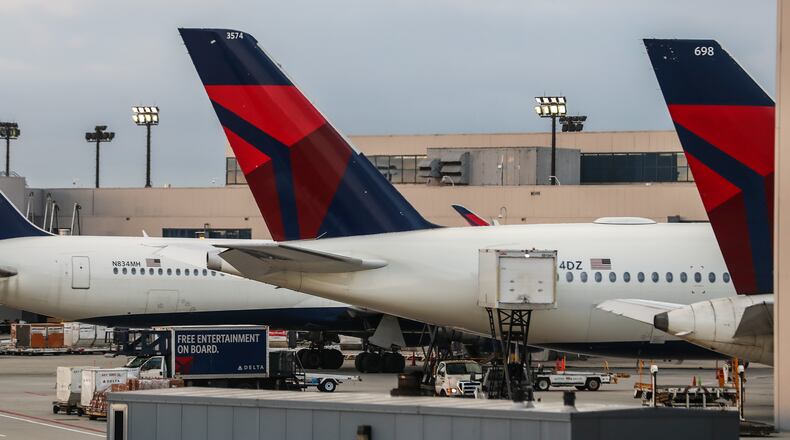 January 11, 2023 ATLANTA:  Delta planes at Hartsfield-Jackson International Airport. (John Spink / John.Spink@ajc.com)