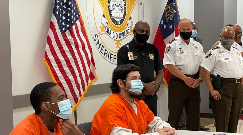 Two of the three graduates from Cobb County's Young Fathers program speak to media members during a press conference Thursday morning at the Cobb County Adult Detention Center (Photos provided/Cobb County Sheriff's Office)