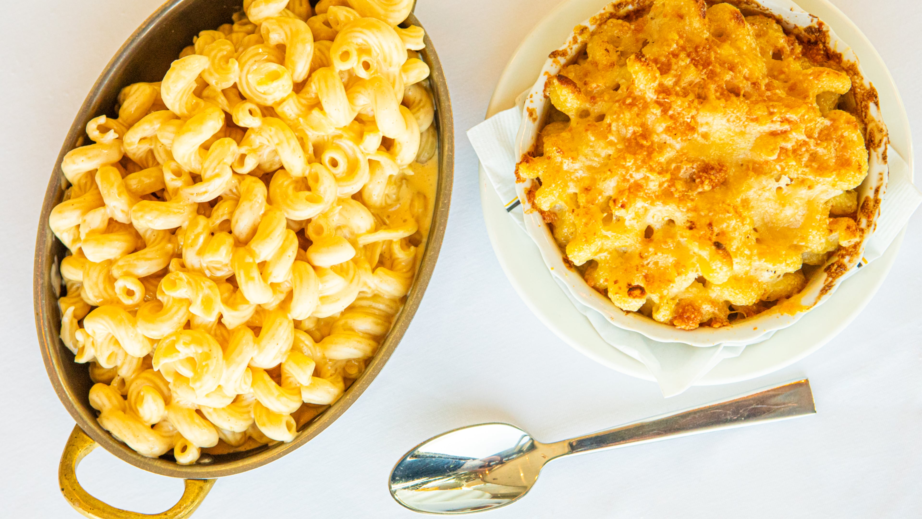 Sun Dial Restaurant’s Kids Macaroni and Cheese (left) and Truffle Mac and Cheese (right). (Aaliyah Man for the AJC)