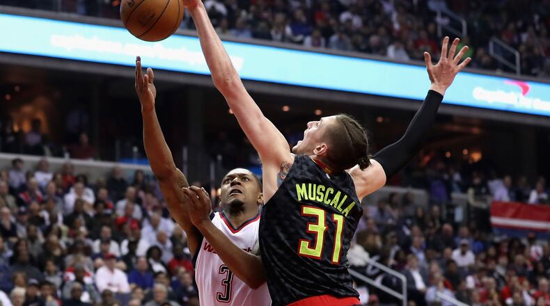 WASHINGTON, DC - APRIL 19: Mike Muscala #31 of the Atlanta Hawks blocks a shot by Bradley Beal #3 of the Washington Wizards in the first half of Game Two of the Eastern Conference Quarterfinals during the 2017 NBA Playoffs at Verizon Center on April 19, 2017 in Washington, DC. NOTE TO USER: User expressly acknowledges and agrees that, by downloading and or using this photograph, User is consenting to the terms and conditions of the Getty Images License Agreement. (Photo by Rob Carr/Getty Images)