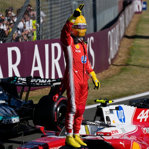Ferrari driver Lewis Hamilton of Britain celebrates after setting a pole position for the sprint race at the British F1 Grand Prix, in Silverstone, England, Friday, July 3, 2026. (AP Photo/Darko Bandic)