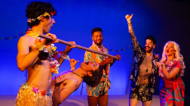 From left, Yo-Yo (Jack Caron), Provoloney (Tim Colee) and Nicky (Corey J. Findley) play limbo as Kanaka (Branden Hembree) and Bettina (Emily Nedvinek) party on in "Psycho Beach Party" at Out Front Theatre.