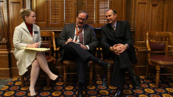 Lt. Gov. Casey Cagle , right, talked with journalist Tom Crawford about his first day presiding over the Senate as Jaillene Hunter, his communications director, listened in Tuesday, Jan. 9, 2007. (Ben Gray /AJC staff)