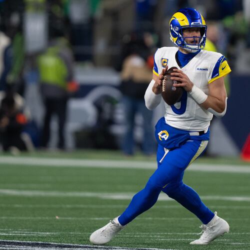 FILE - Los Angeles Rams quarterback Matthew Stafford drops back to pass during a NFC Championship football game against the Seattle Seahawks, Jan. 25, 2026, in Seattle. (AP Photo/Stephen Brashear, File)