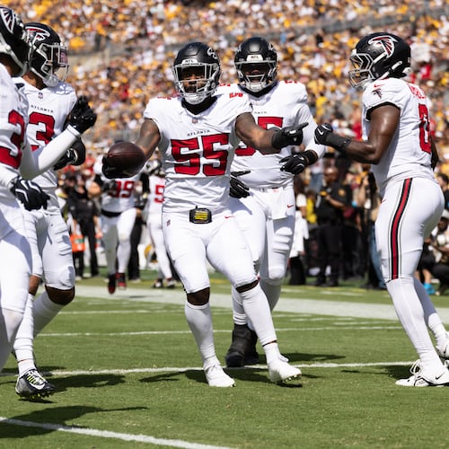 Members of the Atlanta Falcons celebrate a turnover during their game against the Steelers on Sunday, Sept. 13, 2026, in Pittsburgh. Coach Kevin Stefanski acknowledged postgame the team was still “figuring out roles” for a lot of its new players. (Matt Durisko/AP)