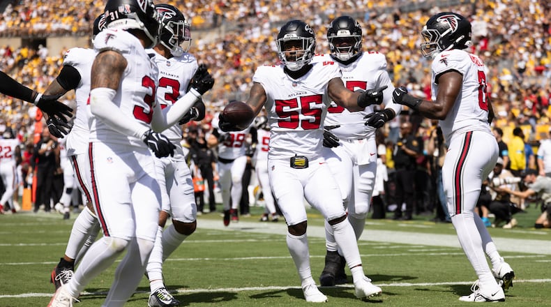 Members of the Atlanta Falcons celebrate a turnover during their game against the Steelers on Sunday, Sept. 13, 2026, in Pittsburgh. Coach Kevin Stefanski acknowledged postgame the team was still “figuring out roles” for a lot of its new players. (Matt Durisko/AP)