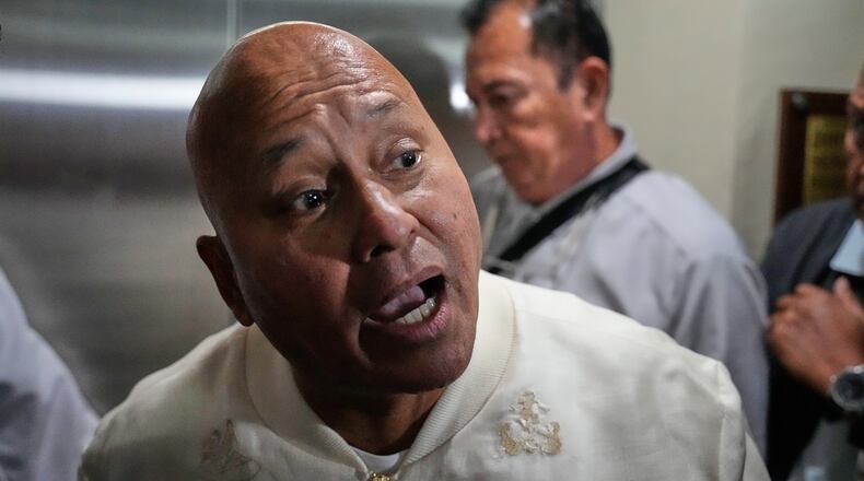 Philippine Senator Ronald dela Rosa speaks to reporters at the Philippine Senate in Pasay, Philippines on Tuesday, May 12, 2026. (AP Photo/Aaron Favila)