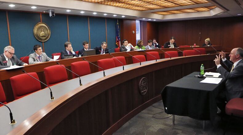 Feb. 8, 2016 - Atlanta - Rep. Allen Peake (right) presents his bill to a committee. BOB ANDRES / BANDRES@AJC.COM