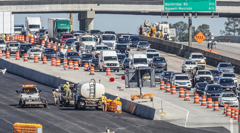 Major traffic disruptions are expected at night this week as construction on the new I-285 interchange at Ga. 400 continues. (File photo by John Spink / John.Spink@ajc.com)