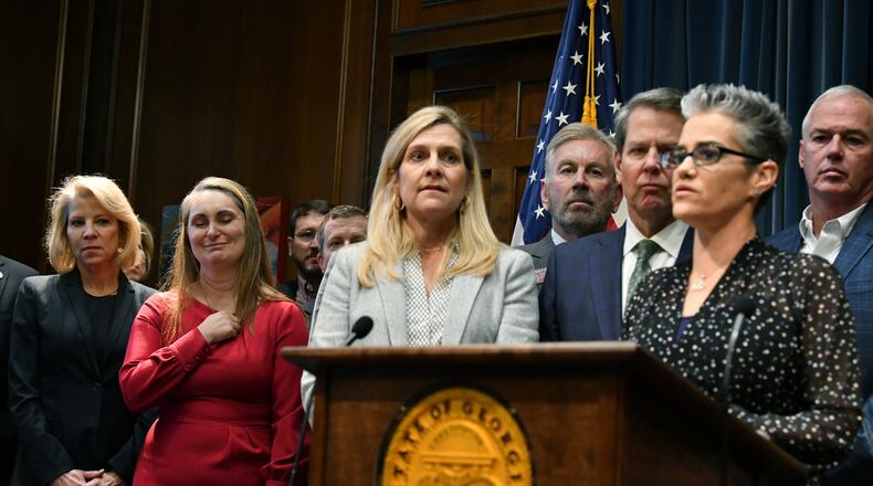 A victim of human trafficking shares her story during a press conference at the Georgia State Capitol on Tuesday, Jan. 21, 2020. Gov. Brian P. Kemp and First Lady Marty Kemp (center) joined Georgians for Refuge, Action, Compassion, and Education (GRACE) Commission members and special guests to announce legislative measures to combat human trafficking here. (Hyosub Shin / Hyosub.Shin@ajc.com)