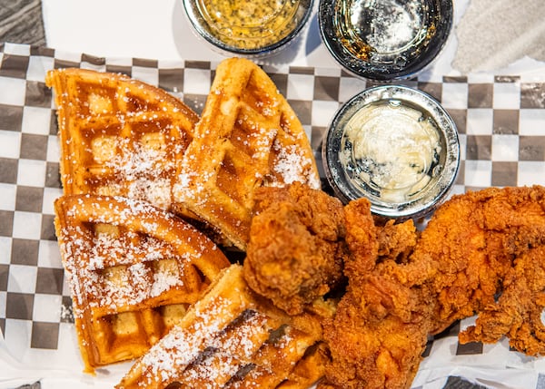 Waffle with Chicken Tenders made and styled by Johnny's Chicken & Waffles in Atlanta, Ga., Wednesday, May 6, 2026. (Aaliyah Man for the AJC)