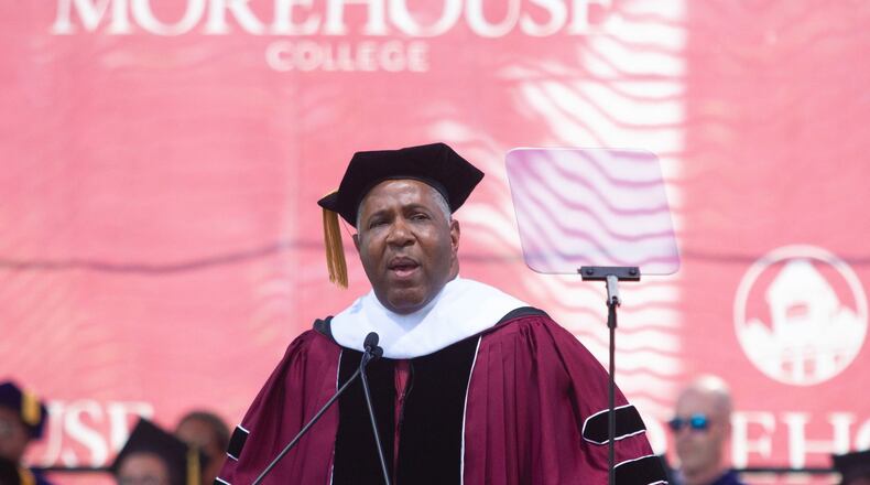 Even those who aren’t so rich can follow the example of billionaire Robert F. Smith, shown at the May 19 Morehouse College graduation, and donate money to help college students. STEVE SCHAEFER / SPECIAL TO THE AJC