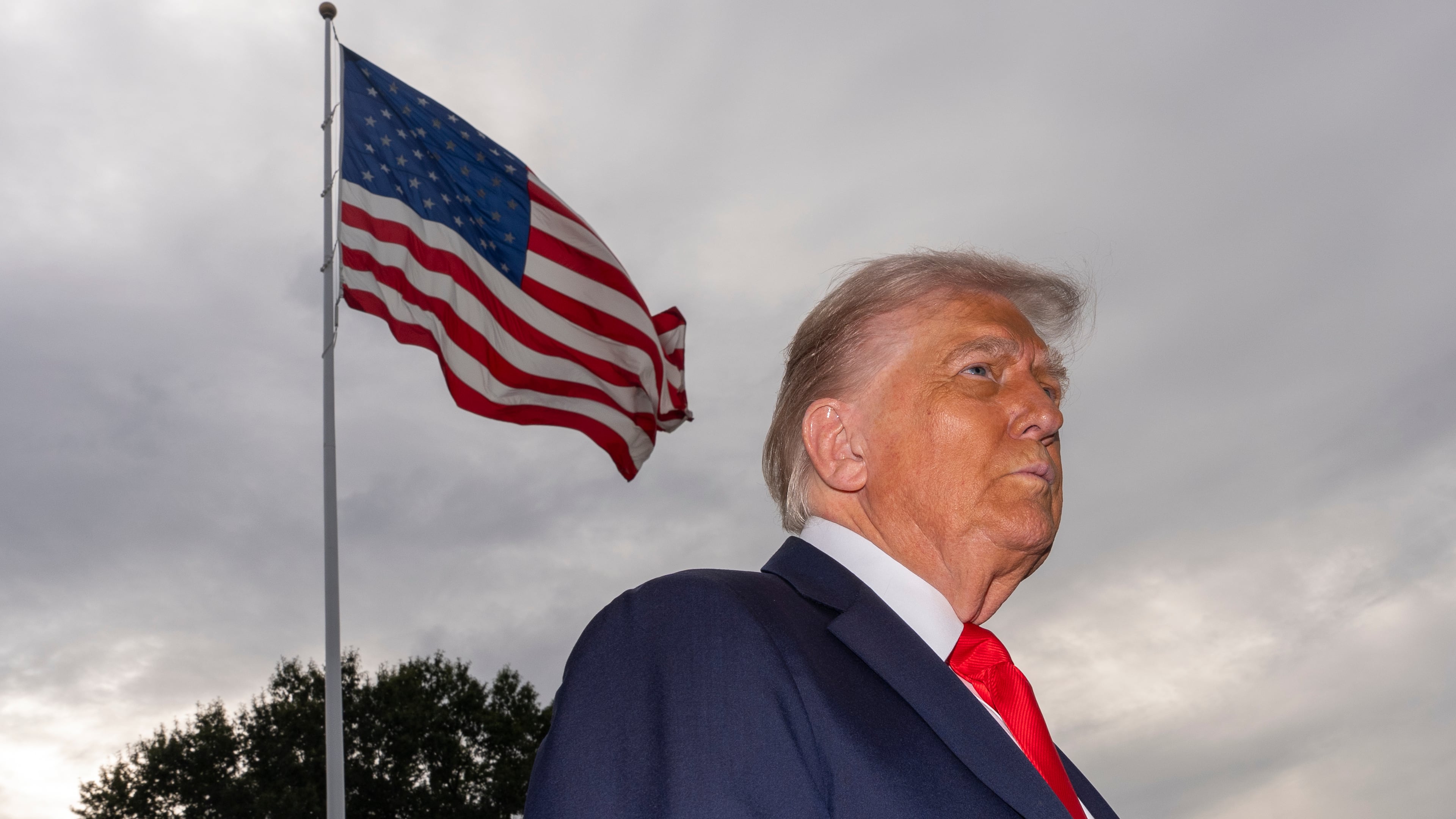 President Donald Trump speaks with reporters before departing on Marine One from the South Lawn of the White House, Tuesday, Sept. 16, 2025, in Washington. (AP Photo/Alex Brandon)