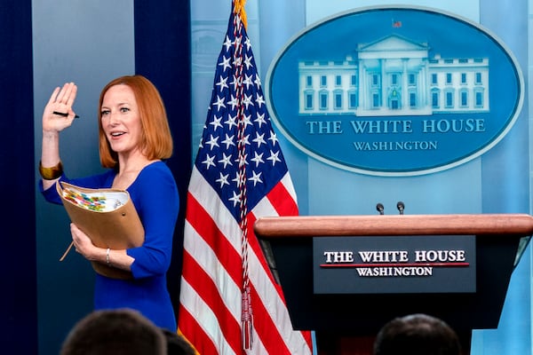 FILE - White House press secretary Jen Psaki waves goodbye at her last press briefing at the White House in Washington, May 13, 2022. (AP Photo/Andrew Harnik, File)