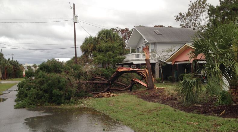 Matthew's high winds, which neared 100 mph as the storm crossed over Tybee Island, left plenty of wreckage behind. (Dan Chapman / dchapman@ajc.com)